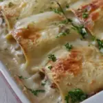 Involtini di lasagne con prosciutto e funghi