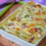 Gratin di zucchine con prosciutto e formaggio