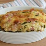 Gratin di zucchine con prosciutto e formaggio