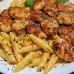 Bocconcini di pollo al burro d’aglio con pasta al parmigiano