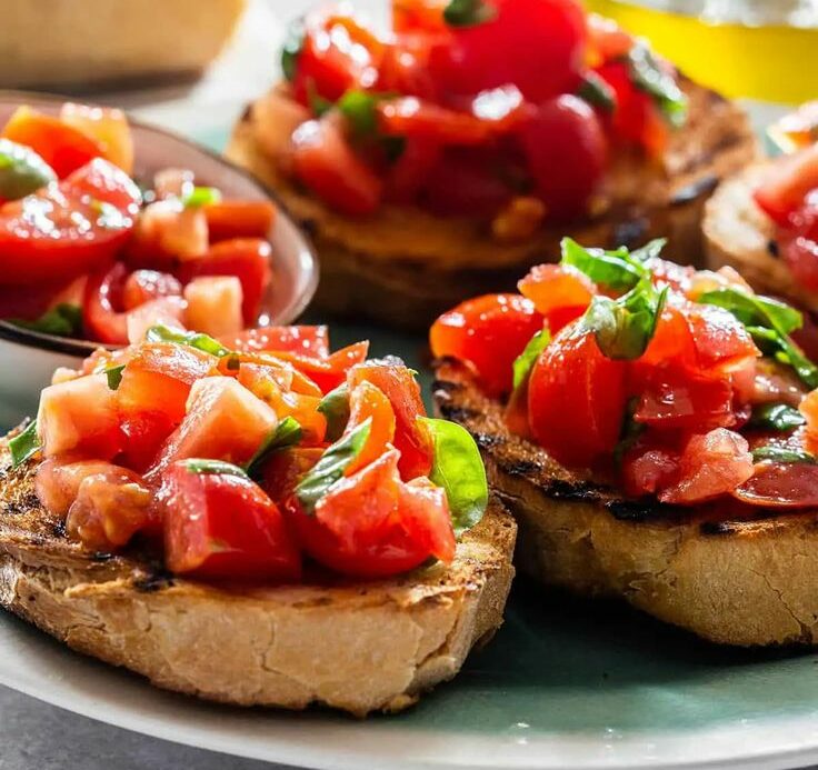 Godetevi un classico italiano: la bruschetta con pomodori freschi e aglio – uno spuntino veloce per ogni occasione!